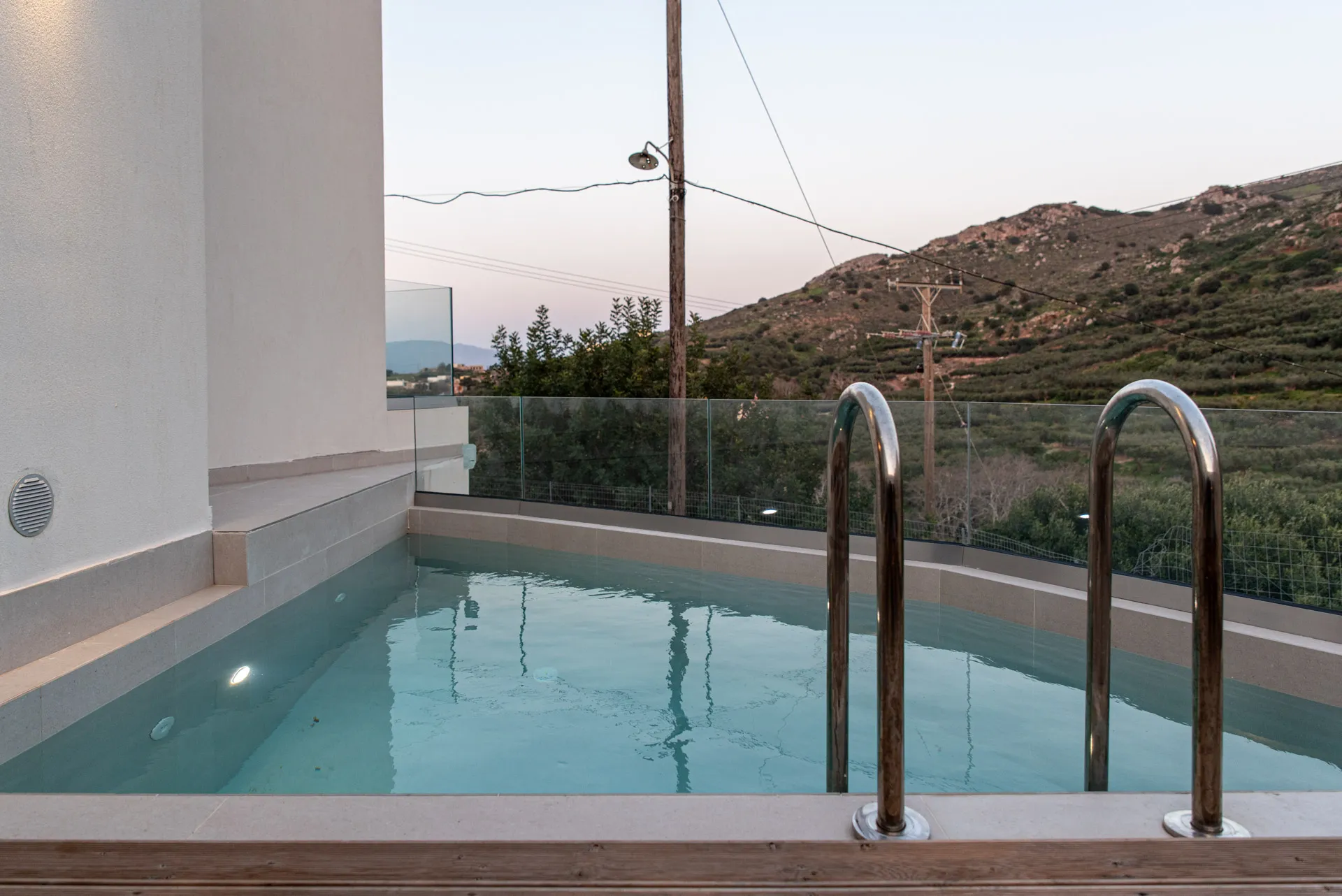 Sun loungers by pool